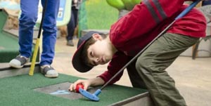 family mini golf at the museum photo