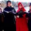 the very merry dickens carolers at newport car museum small photo